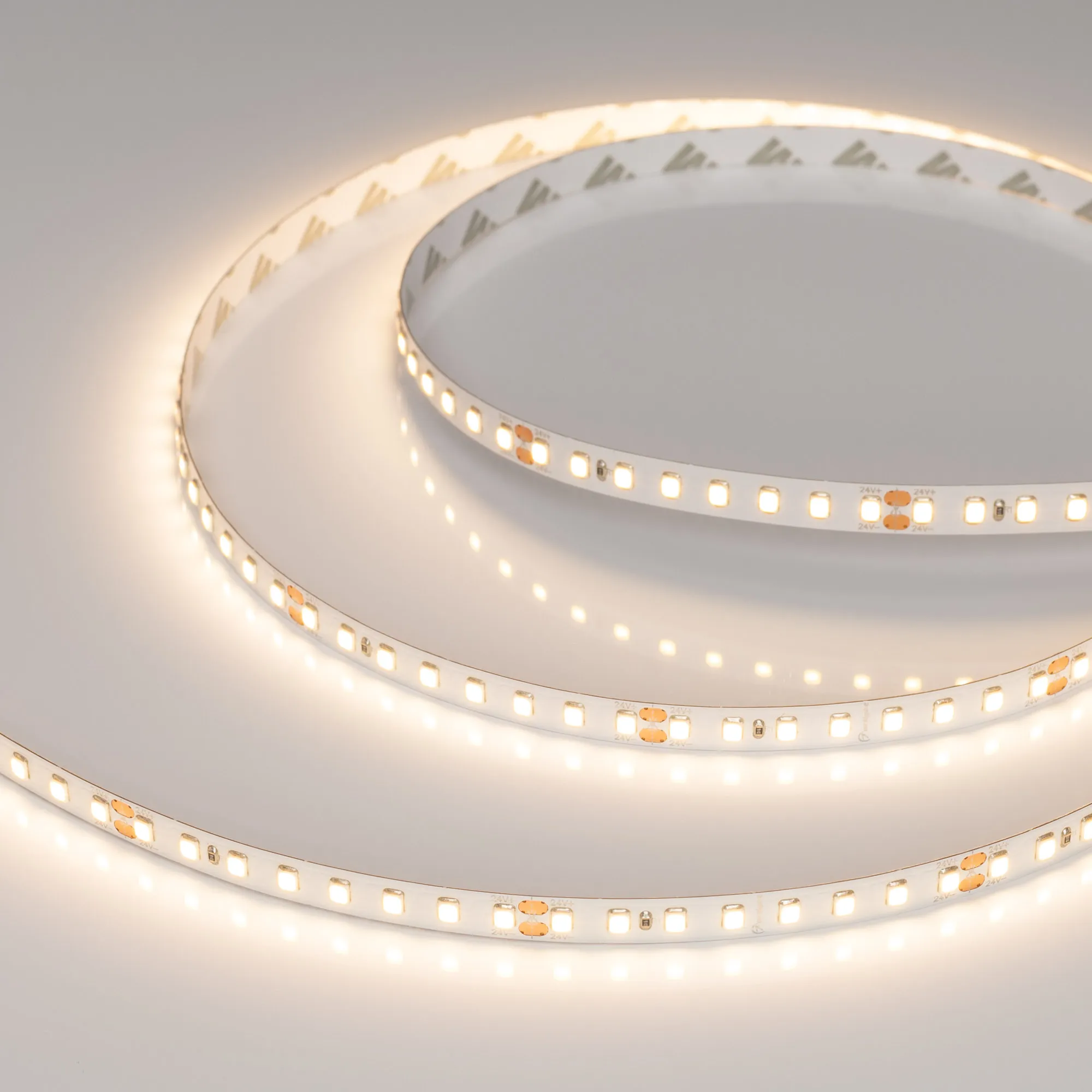 Лента светодиодная RT-A128-8mm 24V Warm3000 (9.6 W/m, IP20, 2835, 5m) (Arlight, высок.эфф.150 лм/Вт)