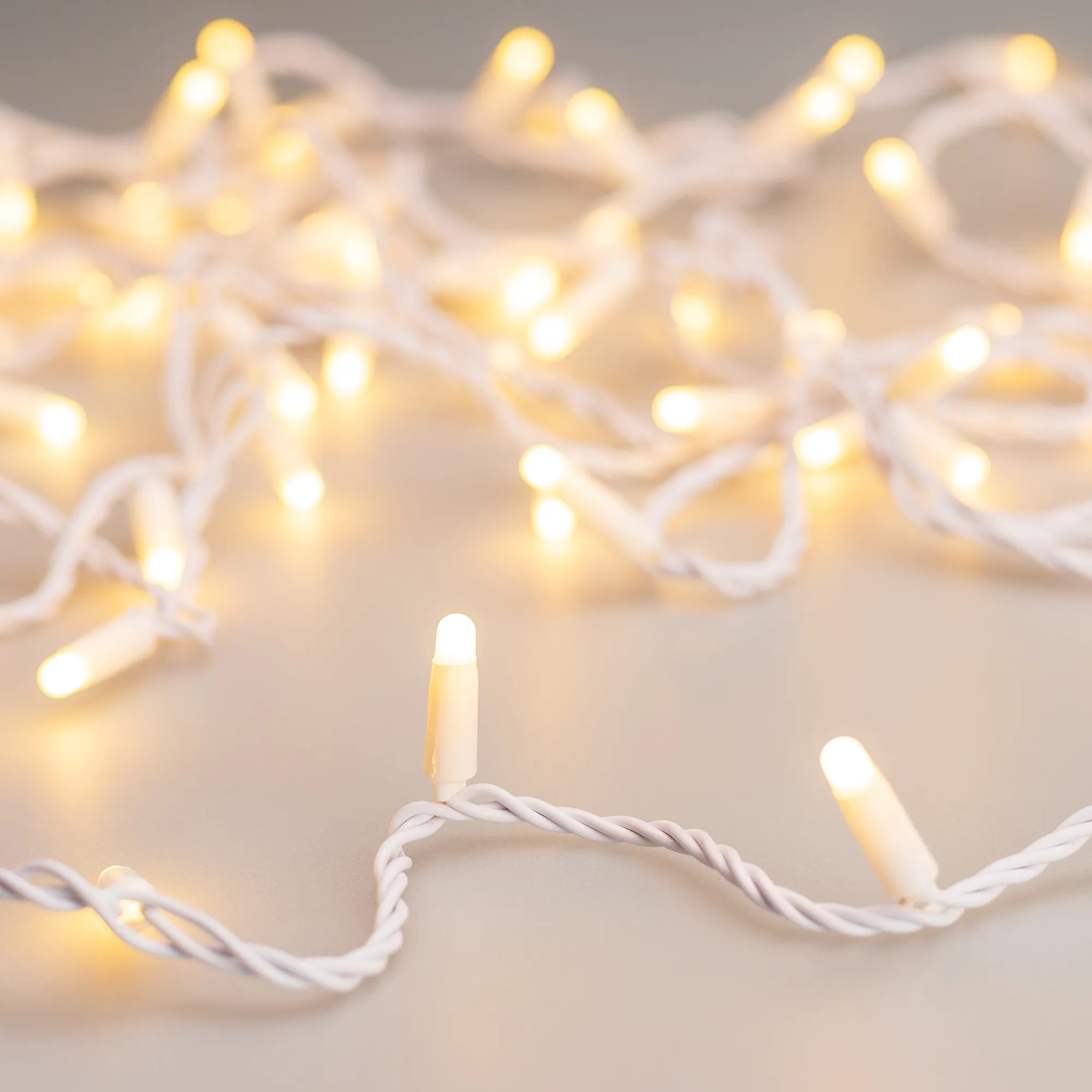 Светодиодная гирлянда ARD-STRING-CLASSIC-10000-WHITE-100LED-MILK-PULSE Warm (230V, 7W) (Ardecoled, IP65) - изображение товара